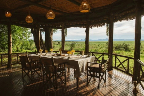 Open dining terrace at Katavi Wildlife Camp overlooking the plains of Katavi National Park
